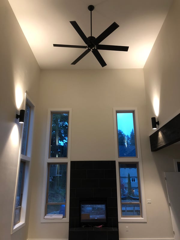 Ceiling fan in tall entry of new home