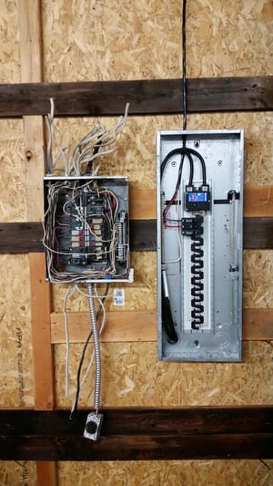 Two 200 Amp electrical panels size comparison